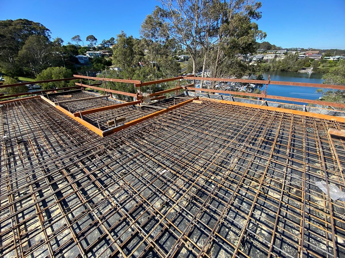 Steel reinforcement fixed across a large elevated deck