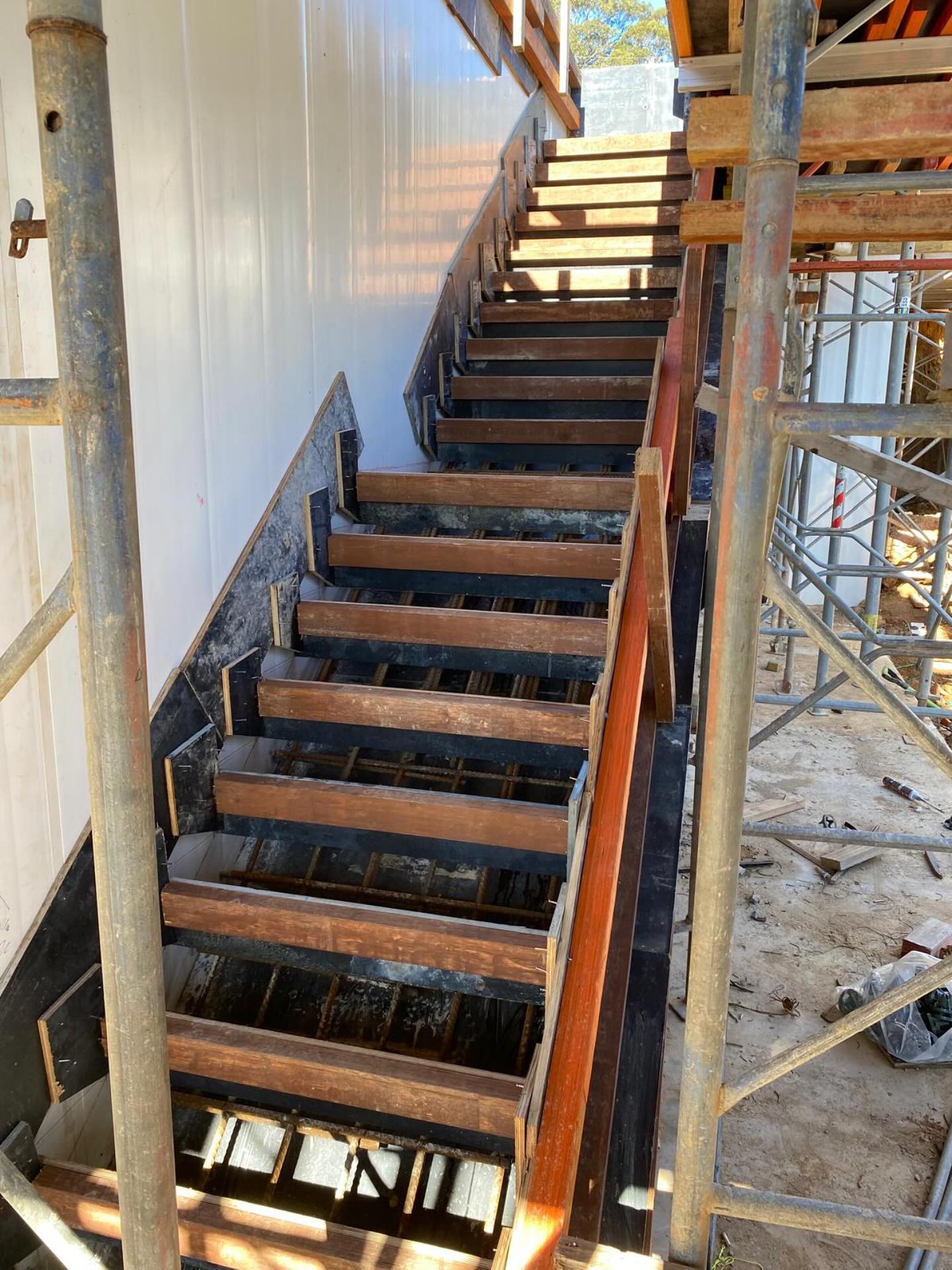 Formed concrete stair structure under construction